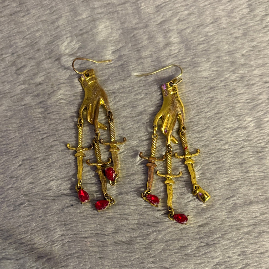Spencers Gold Hand Dangle Earrings With Red Accents 10$